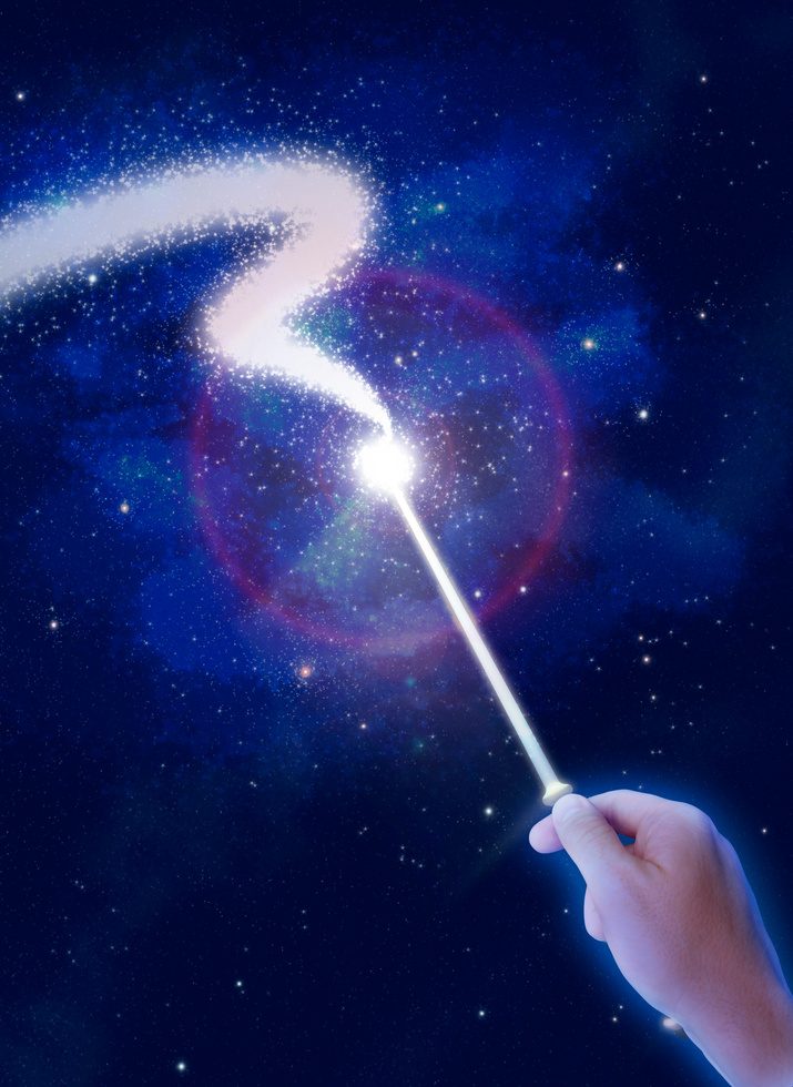 Person waving magic wand, night, close-up of hand (Digital Composite)